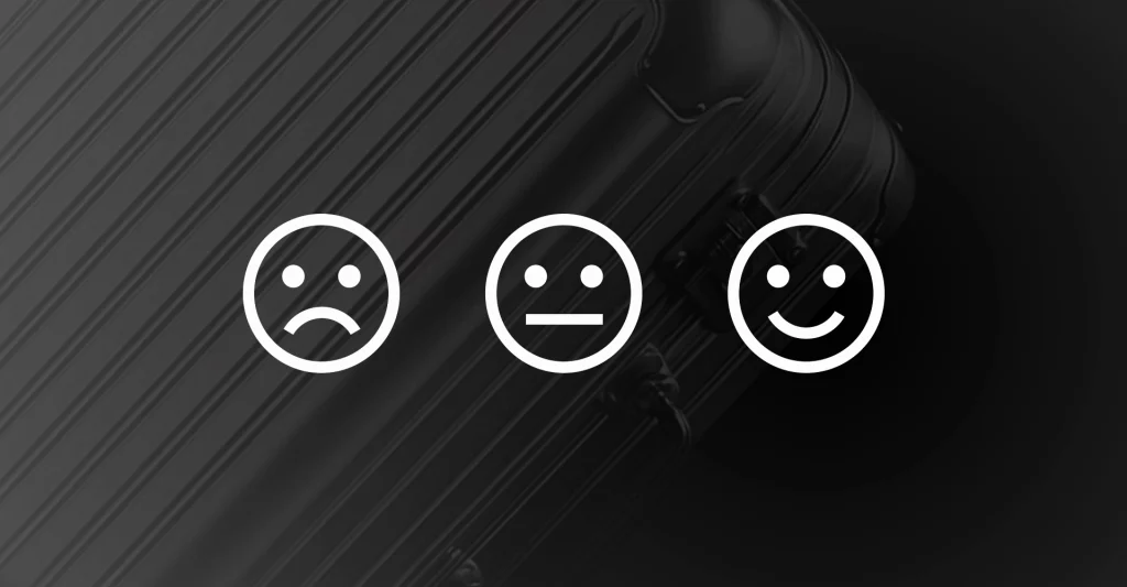 Illustration du Net Promoter Score, avec des émoji blanc sur fond noir avec valise Rimowa.